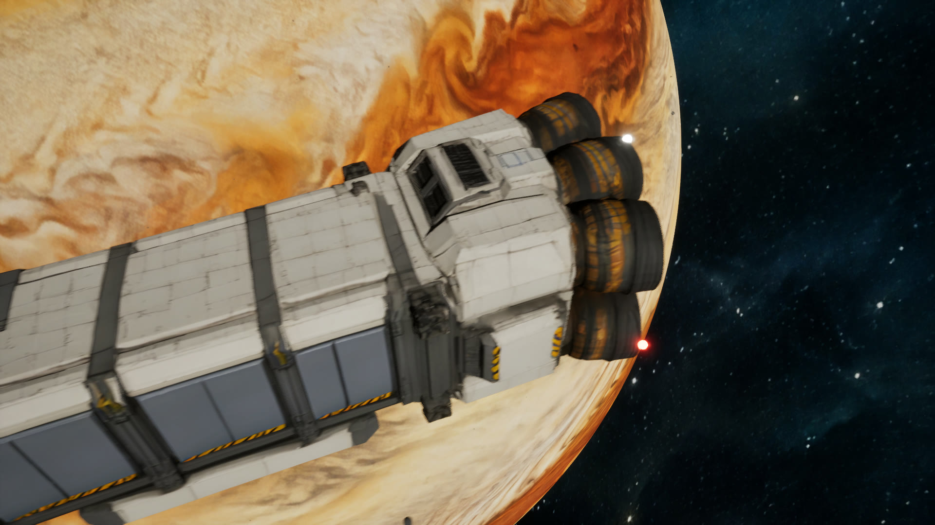 The player’s freighter up close: its long white hull and dark engine bells against the amber gas giant.